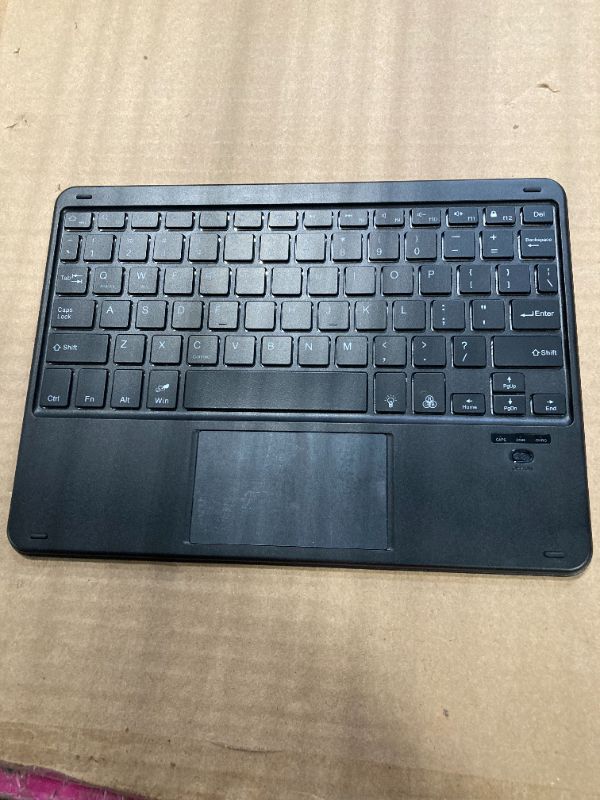 Photo 1 of *** SIMILAR *** Wireless Bluetooth Keyboard,10-inch Ultra-Slim 7 Color Backlight with Touchpad,Rechargeable Wireless Magnetic Bluetooth Portable Keyboard,for Smartphone Laptop Tablet Travel (Black)