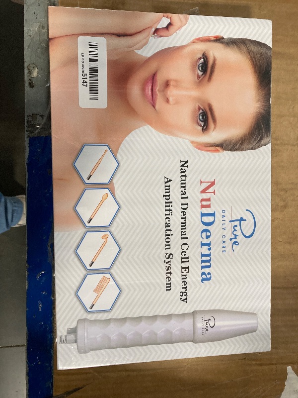 Photo 1 of *****FRABIC SEALED**** Pure Daily Care NuDerma Handheld Skin Therapy Wand Machine w/Neon – Anti-Aging - Skin Tightening - Wrinkle Reducing - Dark Circles – Clarifying - Hair & Scalp Stimulator