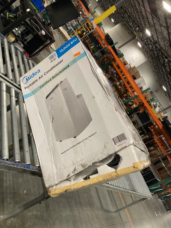 Photo 1 of ****It turns on perfectly.***** doesn't have control**** Midea Duo 14,000 BTU(12,000 BTU SACC) High Efficiency Inverter, Quiet Portable Air Conditioner, Cools up to 550 Sq.Ft., Works with Alexa/Google Assistant, Includes Remote Control&Window Kit (Renewed