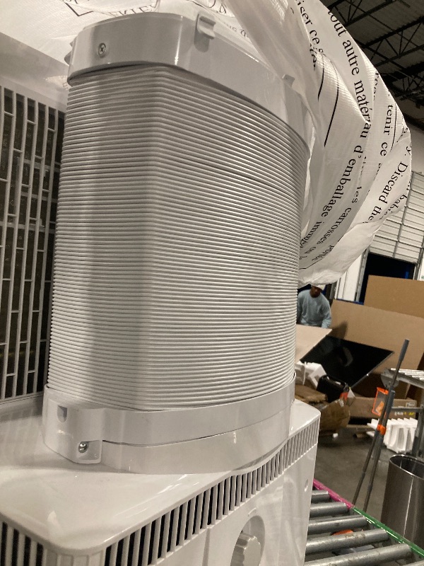 Photo 1 of ****It turns on perfectly.***** doesn't have control**** Midea Duo 14,000 BTU(12,000 BTU SACC) High Efficiency Inverter, Quiet Portable Air Conditioner, Cools up to 550 Sq.Ft., Works with Alexa/Google Assistant, Includes Remote Control&Window Kit (Renewed