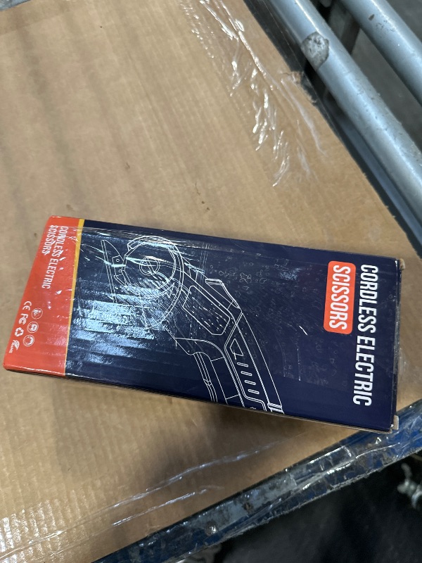 Photo 1 of Cordless Electric Scissors: 4V Rechargeable Rotary Cardboard Cutter, 3000mAh Battery, with LED Light, 2 Blades, Box Cutter for Fabric Carpet Carton Plastic Leather Cloth (Blue)