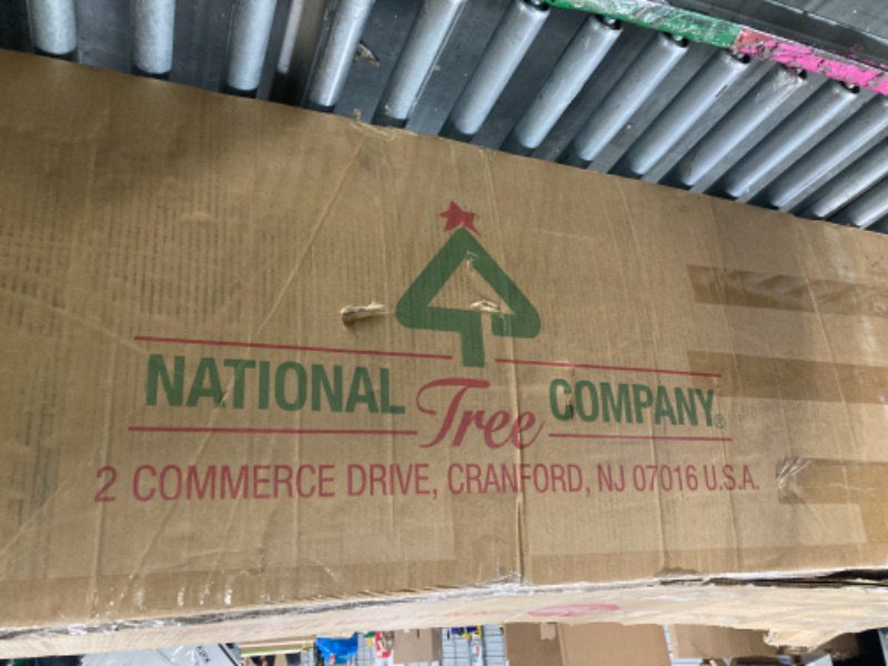 Photo 1 of ***LIGHTS DONT TUURN ON****National Tree Company 10 ft Pre-Lit Dunhill Fir Artificial Christmas Tree, 1,200 LED Lights, 5,090 Tips, PowerConnect, Foot Pedal, 10 Light Functions, Includes Stand, Green