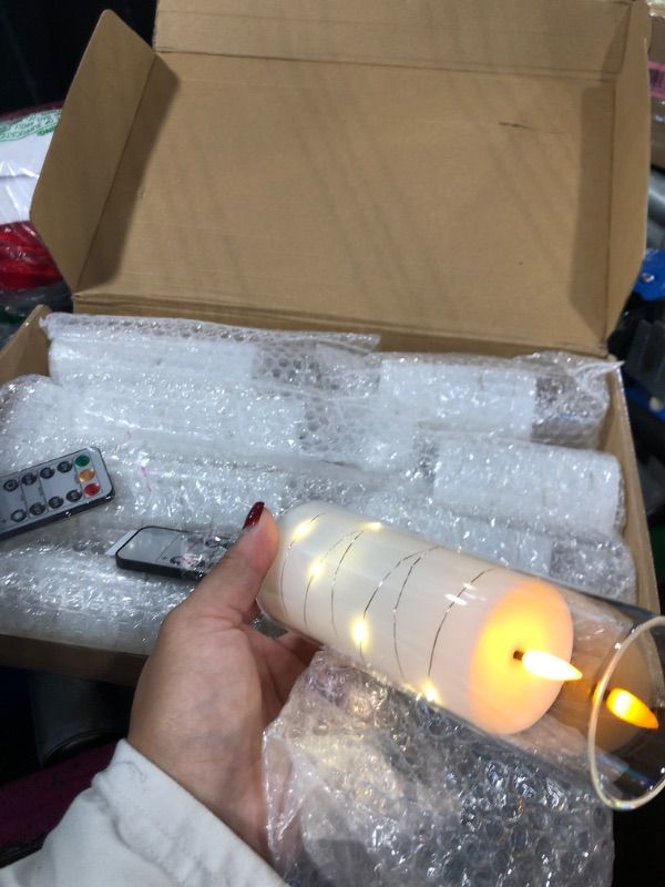 Photo 1 of **BATTERIES NOT INCLUDED** Nimiko Flickering Flameless LED Candles, 9 Pcs with Embedded Star String, Acrylic LED Pillar Candles with Remote, Suitable for Home Decoration (White)