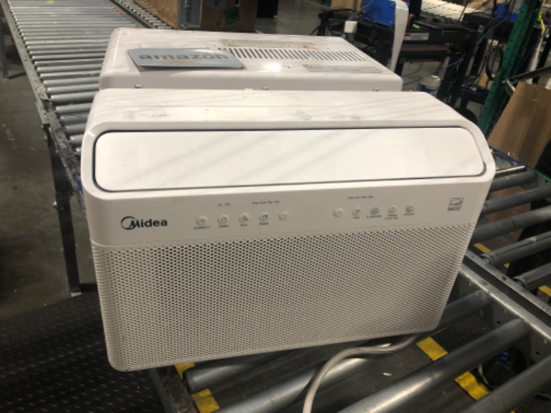 Photo 1 of **** MISSING MANUAL ***** Midea 12,000 BTU U Shaped Smart Inverter Window Air Conditioner - Cools 550 Sq Ft, Ultra Quiet with Open Window Flexibility - Alexa/Google Assistant Compatible - 35% Energy Savings, Remote (Updated)