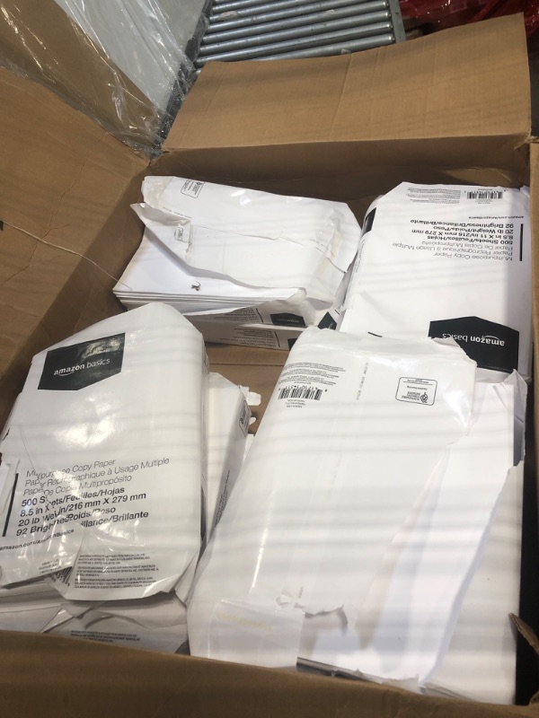 Photo 1 of *****  PACKAGEING DAMAED NOT PAPER ***** 11 REAMS **** Amazon Basics Multipurpose Copy Printer Paper, 8.5 x 11 Inches, 20 lb, 1 Ream, (500 Sheets), 92 Bright, White