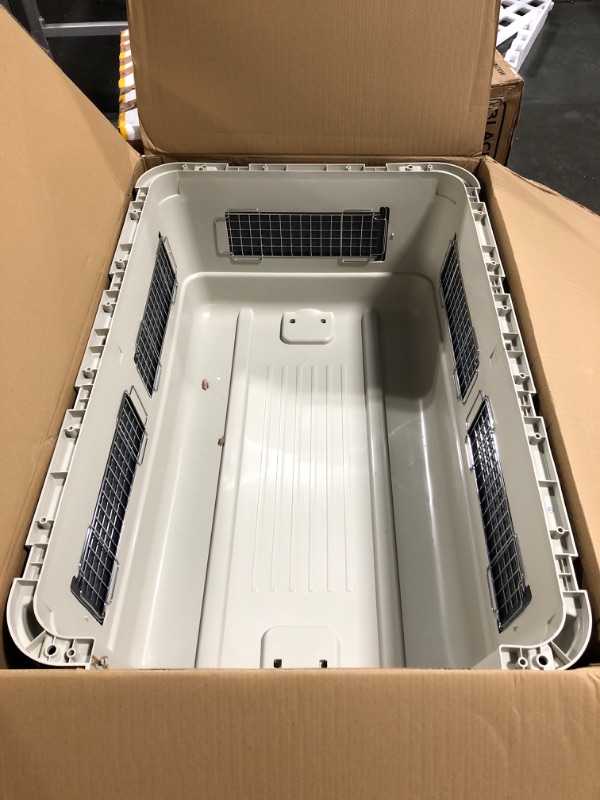 Photo 1 of ** FACTORY SEALED**SOLD AS IS NO REFUND/RETURN**
SportPet Designs Plastic Kennels Rolling Plastic Airline Approved Wire Door Travel Dog Crate, XXX-Large, Gray