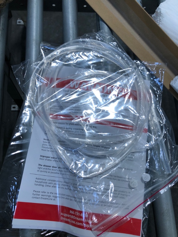 Photo 1 of ** MISSING INSTRUCTIONS**
DreamLine Infinity-Z 50-54 inch W x 72 inch H Semi-Frameless Sliding Shower Door in Matte Black