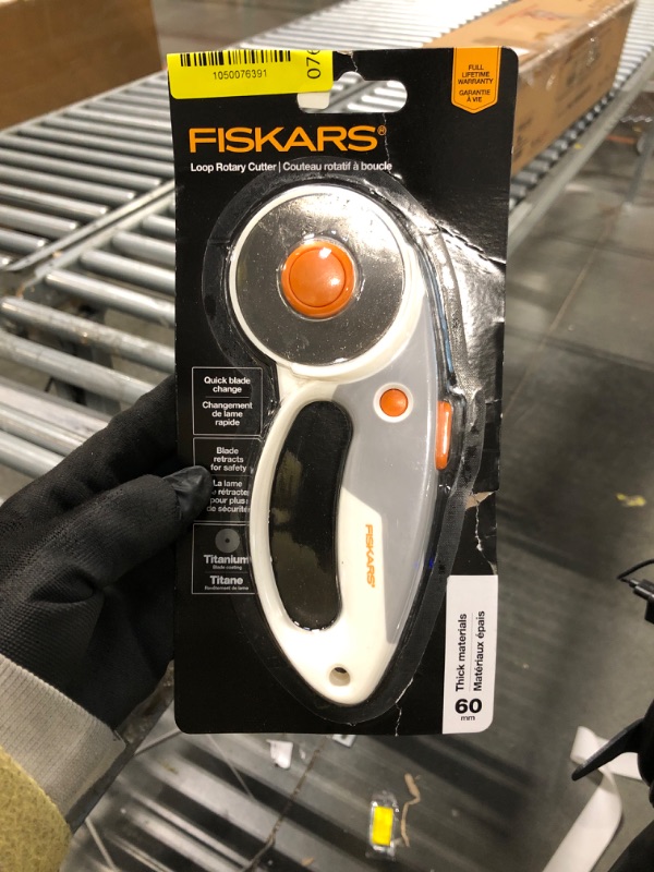 Photo 1 of ** FACTORY SEALED**Fiskars 60mm Rotary Cutter for Fabric with Ergonomic Loop Grip And Comfort Handle, Titanium Rotary Fabric Cutter for Thick Materials, Easy and Safe Blade Change, Sewing Supplies and Quilting Tools