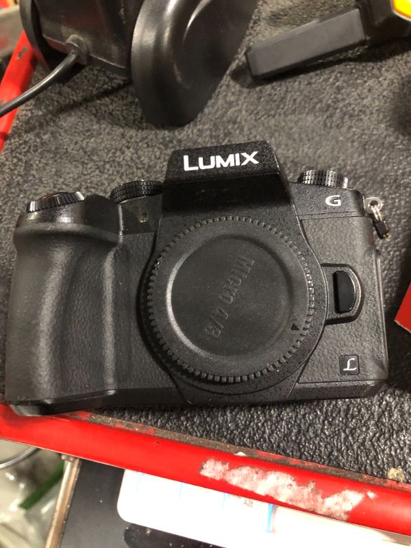 Photo 1 of **MISSING CHARGER**
Panasonic LUMIX G85 4K Digital Camera, 12-60mm Power O.I.S. Lens, 16 Megapixel Mirrorless Camera, 5 Axis In-Body Dual Image Stabilization, 3-Inch Tilt and Touch LCD, DMC-G85MK (Black)