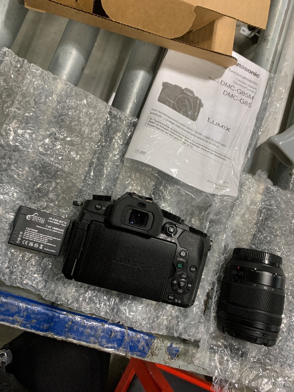 Photo 1 of **MISSING CHARGER**
Panasonic LUMIX G85 4K Digital Camera, 12-60mm Power O.I.S. Lens, 16 Megapixel Mirrorless Camera, 5 Axis In-Body Dual Image Stabilization, 3-Inch Tilt and Touch LCD, DMC-G85MK (Black)