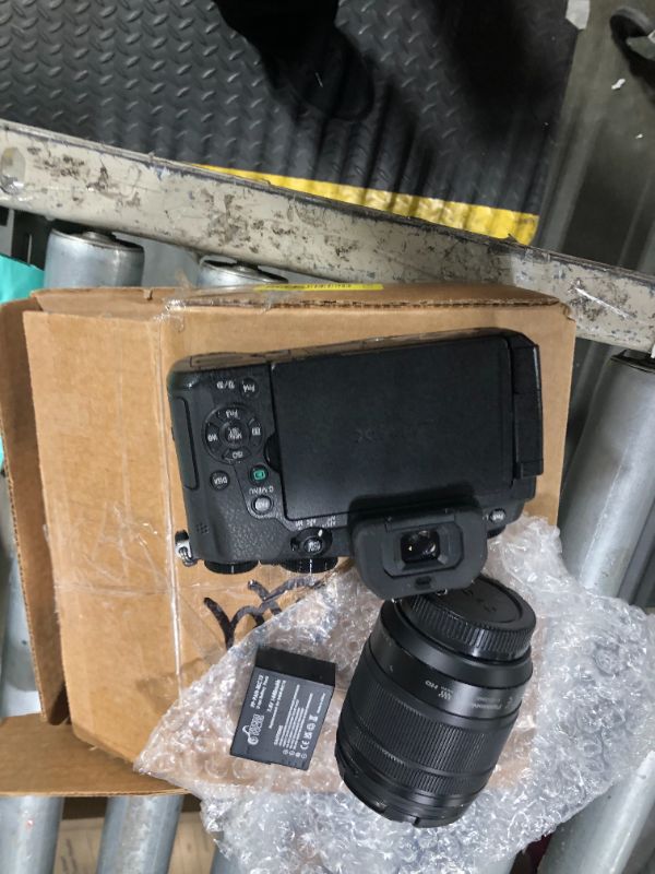 Photo 1 of **MISSING CHARGER**
Panasonic LUMIX G85 4K Digital Camera, 12-60mm Power O.I.S. Lens, 16 Megapixel Mirrorless Camera, 5 Axis In-Body Dual Image Stabilization, 3-Inch Tilt and Touch LCD, DMC-G85MK (Black)