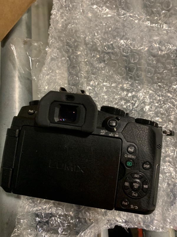 Photo 1 of **MISSING CHARGER**
Panasonic LUMIX G85 4K Digital Camera, 12-60mm Power O.I.S. Lens, 16 Megapixel Mirrorless Camera, 5 Axis In-Body Dual Image Stabilization, 3-Inch Tilt and Touch LCD, DMC-G85MK (Black)