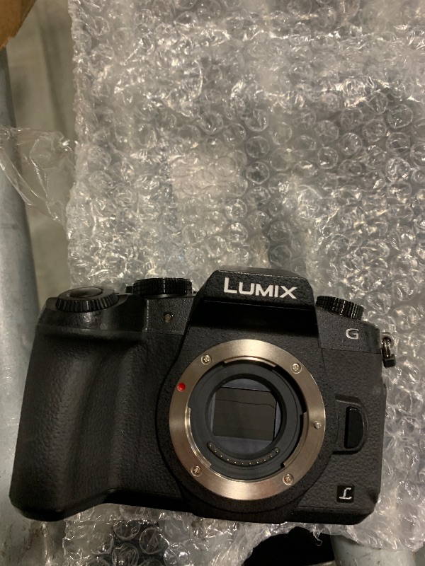 Photo 1 of **MISSING CHARGER**
Panasonic LUMIX G85 4K Digital Camera, 12-60mm Power O.I.S. Lens, 16 Megapixel Mirrorless Camera, 5 Axis In-Body Dual Image Stabilization, 3-Inch Tilt and Touch LCD, DMC-G85MK (Black)