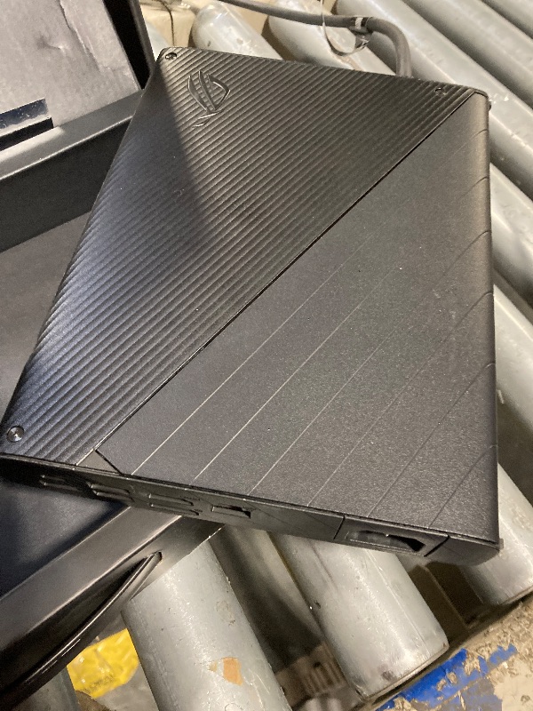 Photo 1 of **MISSING POWER CORD**
ASUS ROG XG Mobile (2023) External Graphics Card Docking Station for ROG Flow Series, GeForce RTX 4090, I/O Hub, 330W Power Adapter