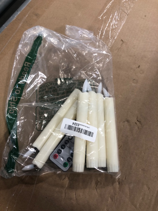 Photo 1 of *USED*
Yeelida Battery Operated Flameless Taper Candles with Two Remote Timer, 6.4" LED 3D-Wick Window Candles, Flickering Long-Lasting Warm Light Electric Pack of 6 Flameless Candlesticks (0.78" Dia,Ivory)