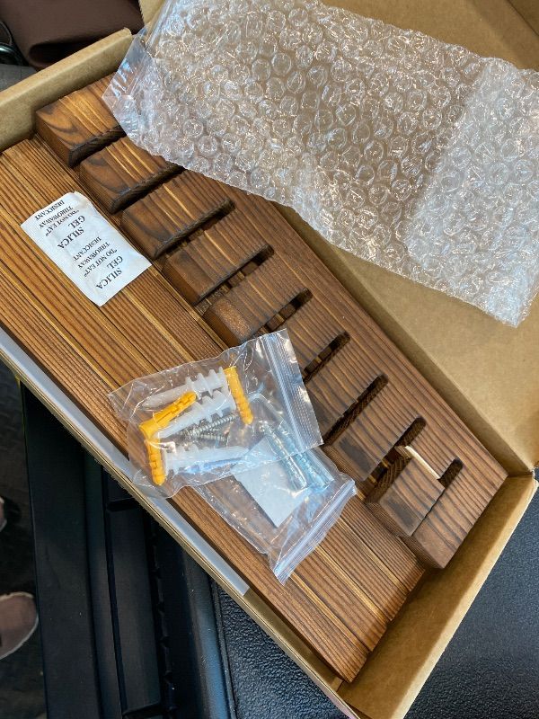 Photo 1 of **MINOR DAMAGE - USED**
UGZOO Belt Organizer for Closet, Belt Hanger Wall Mounts to Hold 9 Belts Without Slipping, Space Saving Belt Rack for Closet Organization Includes Mounting Hardware (11.8” x 5.5” x 2.5”) (Brown)