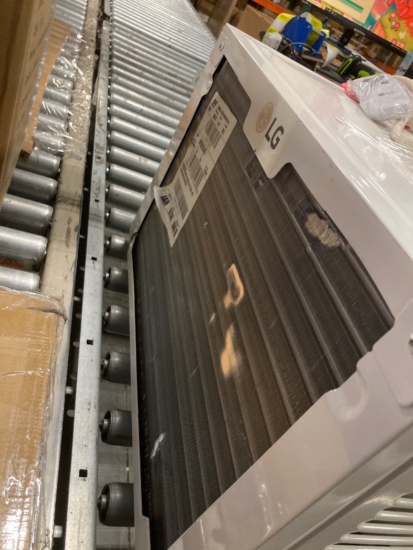 Photo 1 of ***HE HAS A SMALL DAMAGE TO HIS BACK*** LG 10, 000 BTU Smart Window Air Conditioner, 115V, Cools up to 450 Sq. Ft., Smartphone and Voice Control, LG ThinQ enabled, works with Amazon Alexa and Hey Google, 3 Cool & Fan Speeds, White