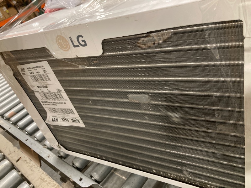 Photo 1 of ***HE HAS A SMALL DAMAGE TO HIS BACK*** LG 10, 000 BTU Smart Window Air Conditioner, 115V, Cools up to 450 Sq. Ft., Smartphone and Voice Control, LG ThinQ enabled, works with Amazon Alexa and Hey Google, 3 Cool & Fan Speeds, White