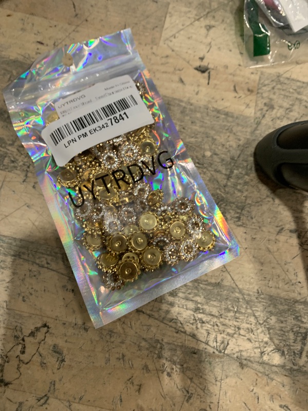 Photo 1 of 100PCS 14MM Sew on Rhinestones Gems, Flower Gold Claw Rhinestones Glass Crystals Jewelry for Crafting Sewing Clothes Dresses Shoes Belt Decoration Accessories (Champagne)