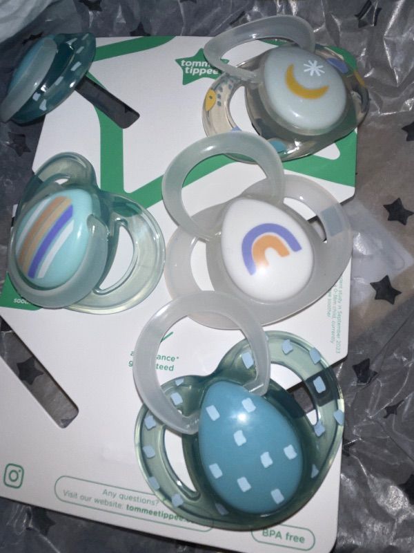 Photo 1 of Tommee Tippee Night Time Pacifier, 6-18 Months, Symmetrical Silicone Baglet, BPA-Free Binkies, Glow in The Dark Technology, Blue Rainbow, Pack of 6