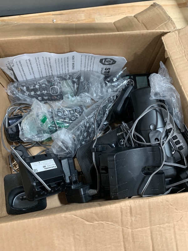 Photo 1 of (missing pieces) Panasonic DECT 6.0 Expandable Cordless Phone System with Answering Machine and Enhanced Noise Reduction - 5 Handsets - KX-TGE645M (Metallic Black)