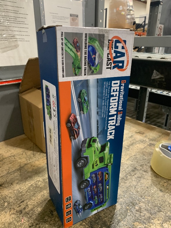 Photo 1 of Toddler Car Truck Toys,Car Carrier Truck Toys for Kids Age 3-5 4-8,Foldable Car Track Sets with 2.8-Ft Race Track and 6 Die-Cast Race Cars, Truck Toys Gifts for 3 4 5 6 7 8+ Year Old Boys Girls(Green)