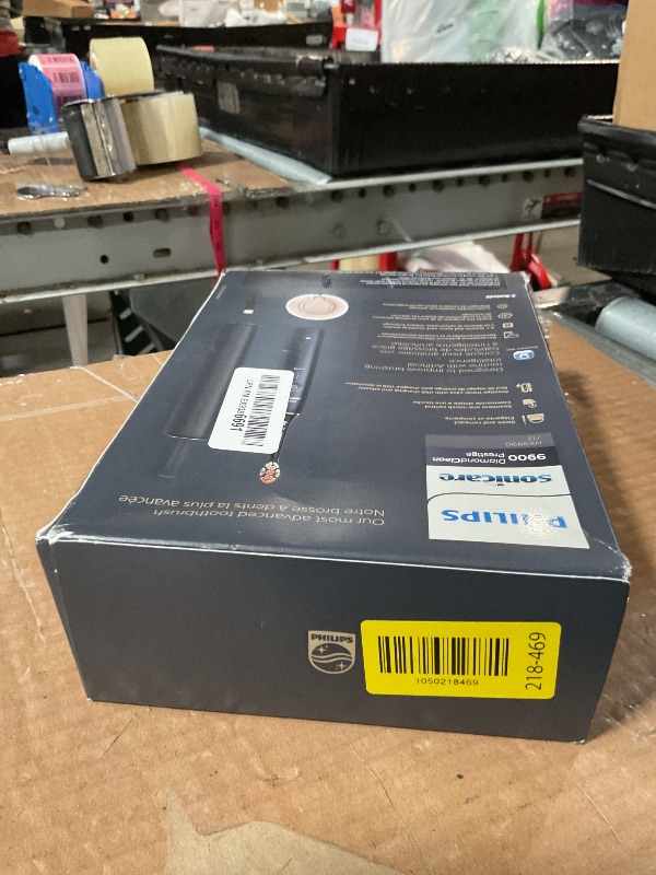 Photo 1 of ***(HEAVILY USED/ MINOR DAMAGE)***Philips Sonicare DiamondClean Prestige 9900 Rechargeable Electric Toothbrush with SenseIQ, 5 Premium All-in-One Brush Heads, Plaque Removal, Gum Care, Whitening, Midnight, BD9002AZ