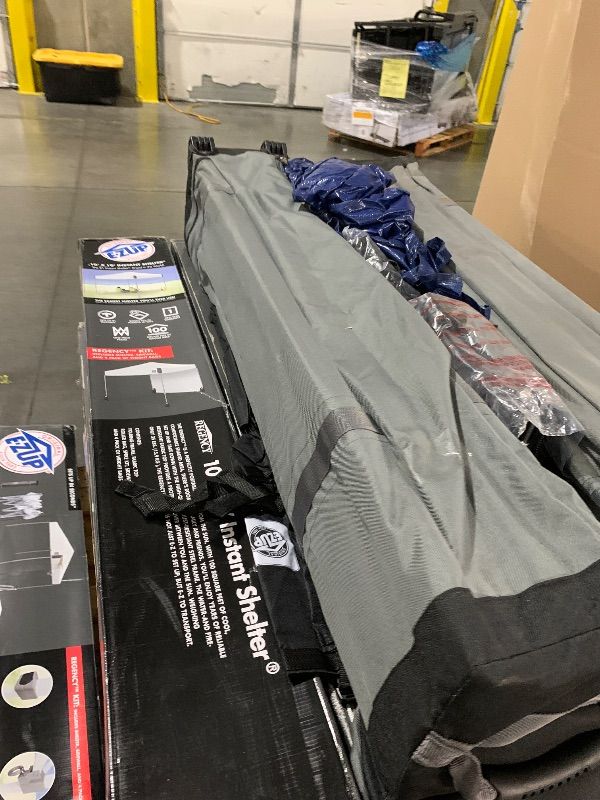 Photo 1 of (broken leg)(sold for parts)(repair) E-Z UP Ambassador Instant Pop Up Canopy Tent, 10' x 10', Roller Bag and 4 Piece Spike Set, Slate White