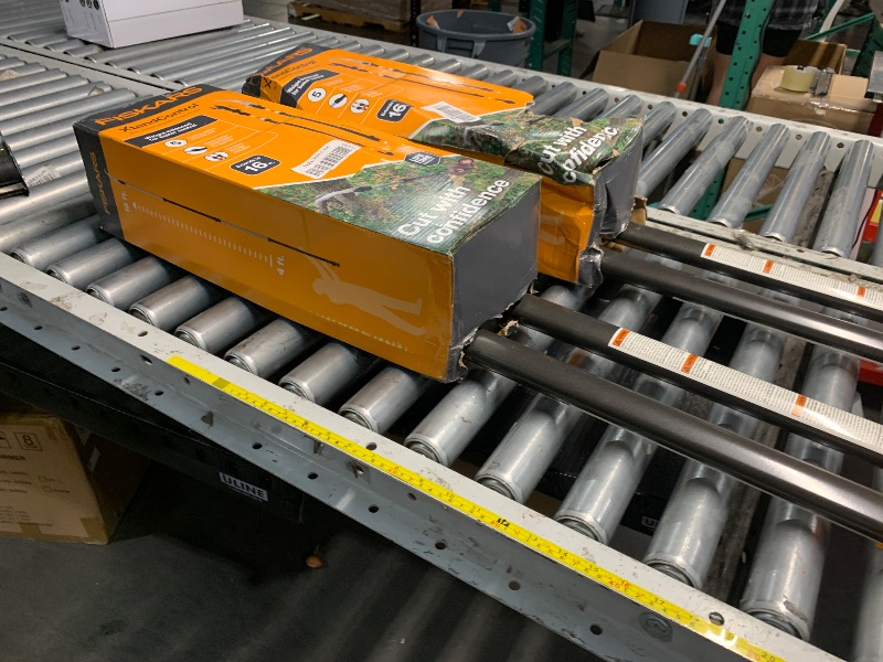 Photo 1 of Fiskars XtendControl Extendable Tree Pruner (16 ft), Adjustable Branch Trimmer with Rotating Pruning Head, 15" X3 Double-Hooked Saw, 4-8 ft Extension Poles & Automatic Cord Reel for Precision Cutting