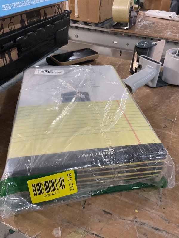 Photo 1 of Amazon Basics 50 sheet Wide Ruled Lined Writing Note Pad, 8.5" x 11.75", 12-Pack, 600 Perforated Sheets, Canary