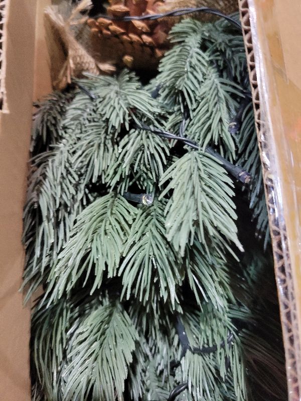 Photo 1 of [ 8 Modes & Timer] 24 Inch Realistic Tabletop Christmas Tree Small Christmas Tree with 50 Warm Lights Battery Operated Indoor Home Table Christmas Decorations