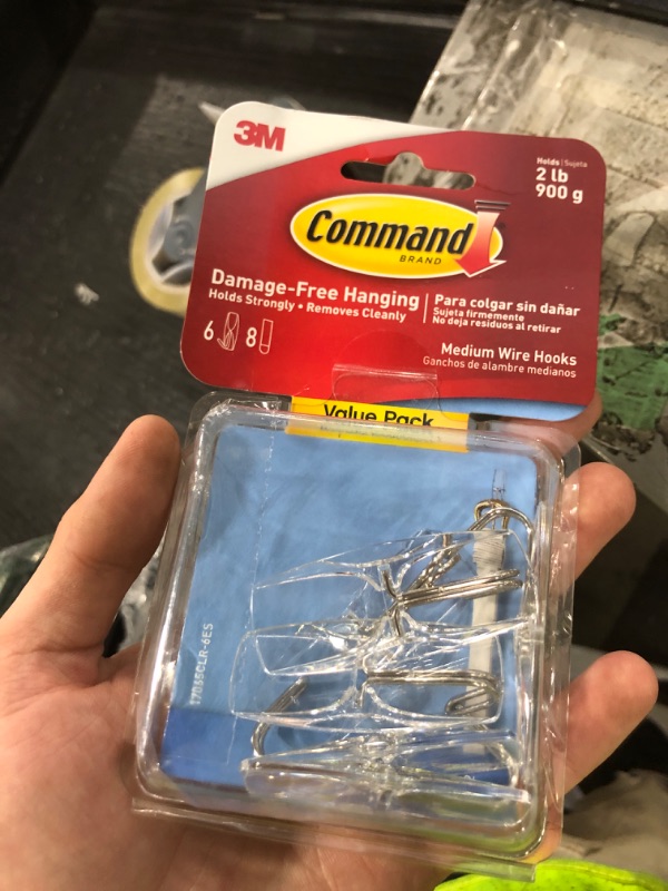 Photo 1 of Command Medium Clear Wire Toggle Hooks, 6 Hooks and 8 Command Strips, Damage-Free Hanging Wall Hangers for Hanging Home Decor, Holds up to 2 lb