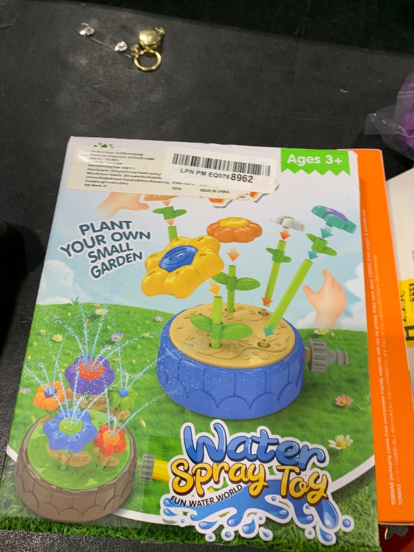 Photo 1 of USMLTOOYS Water Sprinklers Outdoor Toy, Durable and Fun Kids Sprinklers for Yard, Ideal for Summer Backyard Outdoor Water Play Activities, Ages 1-3 Toddlers and 4-8 Children