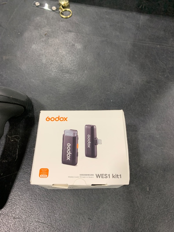 Photo 1 of GODOX WES1 Kit1 Wireless Lavalier Microphone for iPhone, MFi Certified, Plug and Play, Noise Cancelling Lapel Mic with 656ft Transmission, Compatible with iPhone, iPad, for Vlogs/Interviews/Live