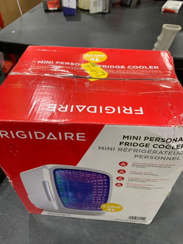 Photo 1 of Frigidaire mini fridge 