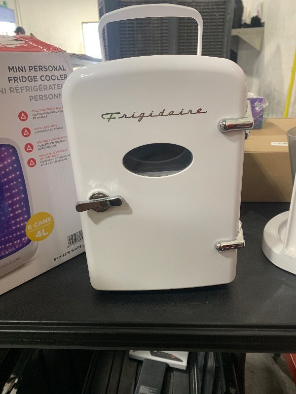 Photo 1 of Frigidaire mini fridge 