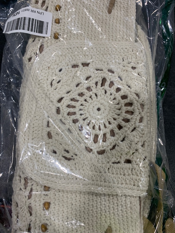 Photo 1 of Eiyye Boho Crochet Backpack for Women, Handmade Cotton Rope Woven Rucksack with Adjustable Straps, Lightweight Travel Daypack for Beach, Picnic, or Casual Outings