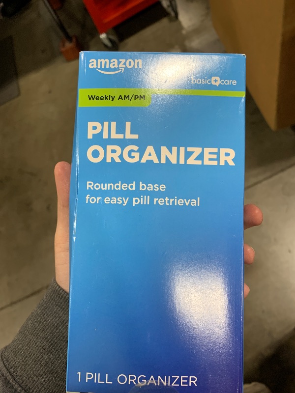 Photo 1 of Amazon Basic Care (7-Day) AM/PM Pill Organizer, Vitamin Case, And Medicine Box, Large Compartments, 2 Times a Day, Blue and Clear Lids