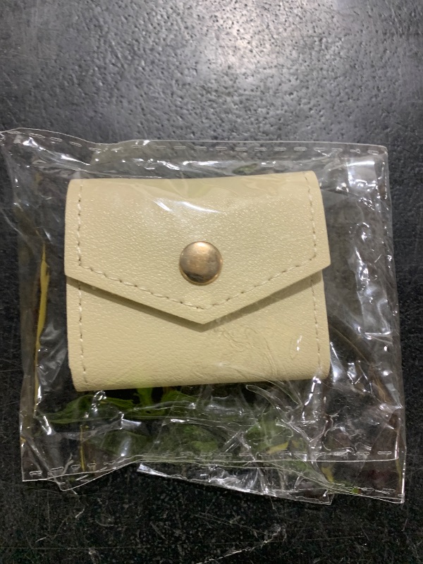 Photo 1 of AfitLulu Mini Travel Jewelry Roll Bag with Buckle, Foldable Multifunctional Mini Travel Jewelry Case, Small Jewelry Bags Storing Rings, Necklaces, Earrings (Apricot)