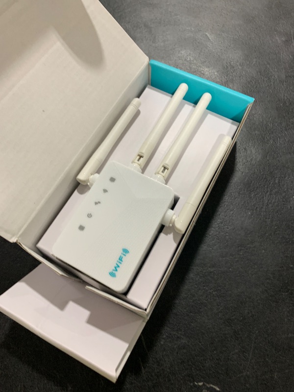 Photo 1 of WiFi Extender Signal Booster for Whole Home & Backyard - 10K Sq.Ft Coverage w/4 Antennas | 90% Faster Internet Booster w/Ethernet Port, Easy Setup Wireless Repeater Works with Any Router | Long Range