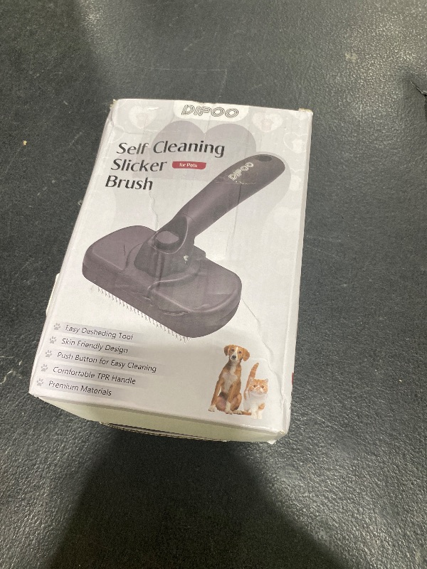 Photo 1 of Dipoo Self Cleaning Shedding Brush - Skin Friendly Grooming Tool for Dogs, Cats, and Puppies, Deshedding and Hair Removal for Long and Short Haired Pets, Black