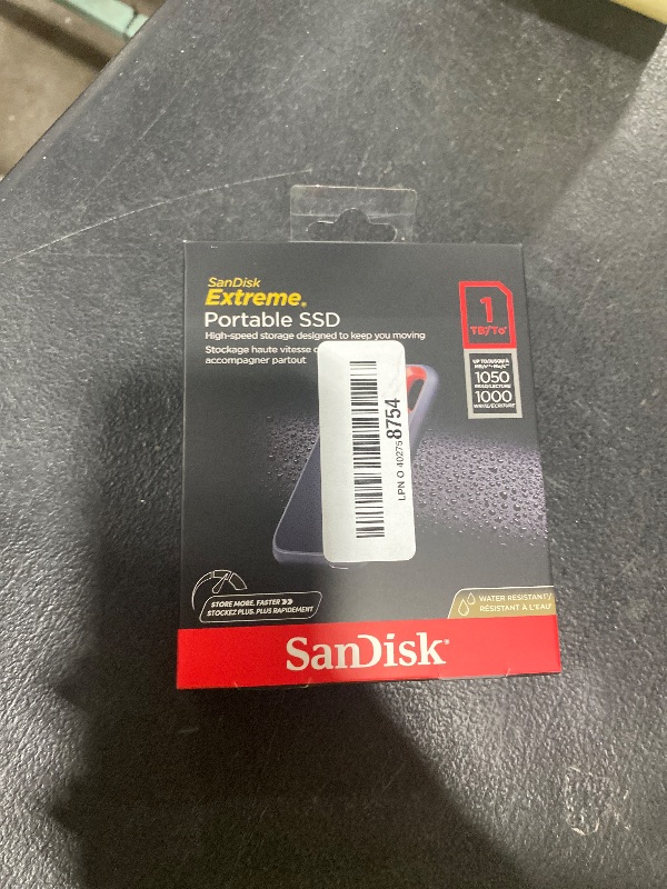 Photo 1 of SanDisk 1TB Extreme Portable SSD - Up to 1050MB/s, USB-C, USB 3.2 Gen 2, IP65 Water and Dust Resistance, Updated Firmware - External Solid State Drive - SDSSDE61-1T00-G25