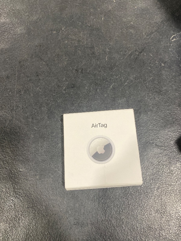 Photo 1 of Apple AirTag. Keep Track of and find Your Keys, Wallet, Luggage, Backpack, and More. Simple one-tap Set up with iPhone or iPad