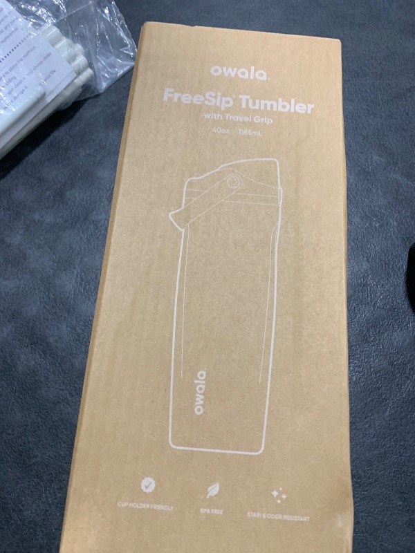 Photo 1 of Owala FreeSip Sway Insulated Stainless Steel Water Bottle with Two-Way Spout, Built-In Straw and Bucket Handle, Made for Travel, School, and Sports, 40oz, BPA Free, Leak Proof, Very, Very Dark