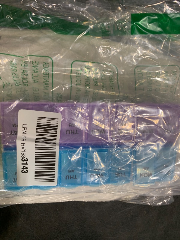 Photo 1 of EZY DOSE Weekly (7-Day) Pill Organizer and Planner, Countoured Bottom for Easy Pill Removal, Large, Blue/Purple Am/Pm
