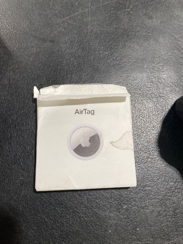 Photo 1 of Apple AirTag. Keep Track of and find Your Keys, Wallet, Luggage, Backpack, and More. Simple one-tap Set up with iPhone or iPad