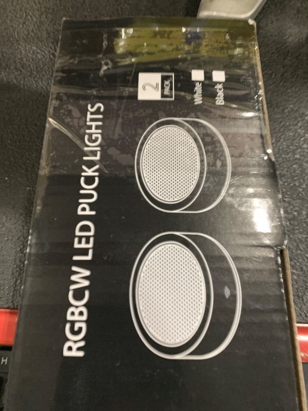Photo 1 of Puck Lights with Remote Timer, Under Cabinet Kitchen Lights Battery Operated LED Lights, Stick on Shelf Lights Wireless Counter Lights, RGB Color Changing Display Lights, 2 Pack White