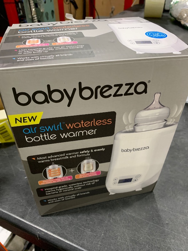 Photo 1 of Baby Brezza AirSwirl Waterless Baby Bottle Warmer - Safely Warm Breastmilk + Formula - Bottles Stay Dry + Nutrients are Protected - Works with Nearly All Bottles
