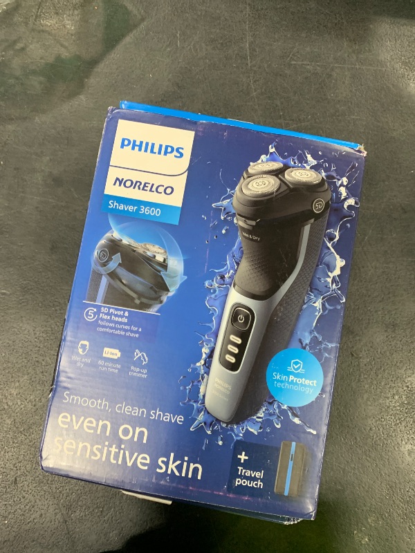 Photo 1 of Philips Norelco Shaver 3600 Series, Wet and Dry Electric Shaver, P-Cap, Travel Pouch, Storm Blue, Model S3243/91