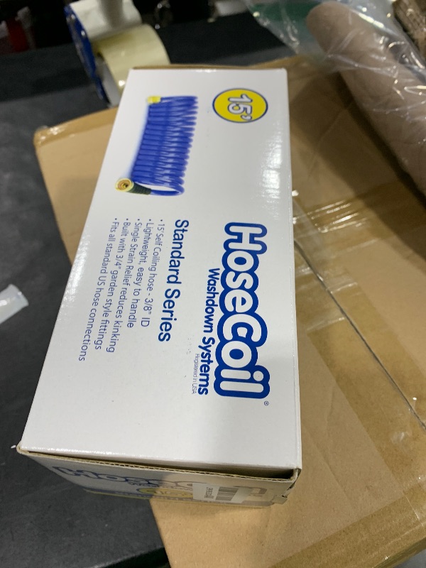Photo 1 of HoseCoil 3/8 inch ID Self Coiling Garden, RV, Marine Outdoor Water Hose (15' Blue)